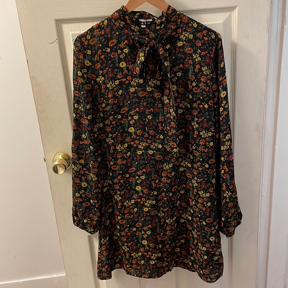 Black floral long sleeve dress with lining and bow at neckline